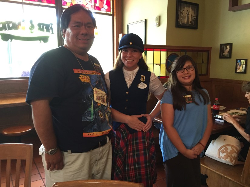 2015-04-19 - Us with our tour guide Valerie who was super sweet, doing the Disney pose